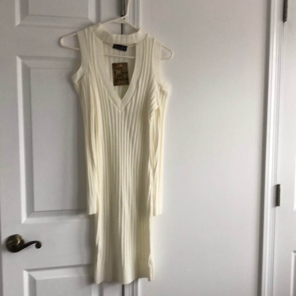 Knit cream dress. Size small. Never warn